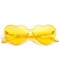 Round One Piece Heart Shaped Rimless Sunglasses Transparent Candy Color Eyewear - 2817-yellow - C118E0GWNWW $11.12